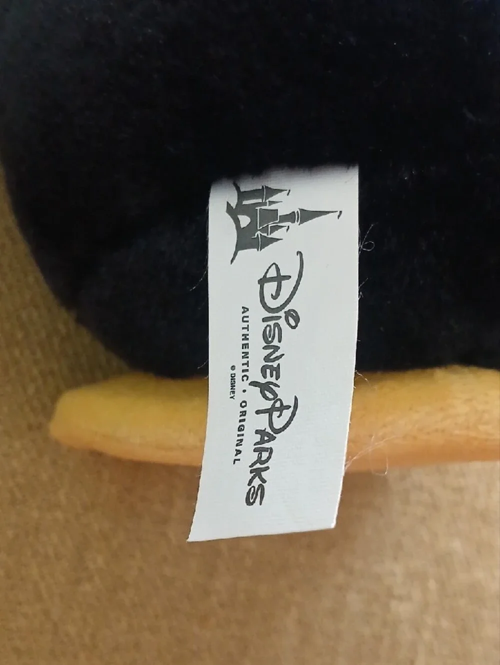 Disney Black & White Penguin Plush with Red Bow. From Toy story Movie.